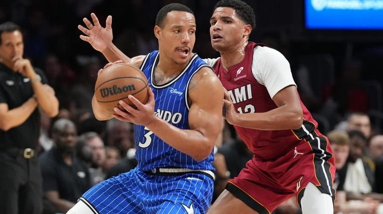 Orlando Magic guard Desmond Bane (3) looks to pass the...