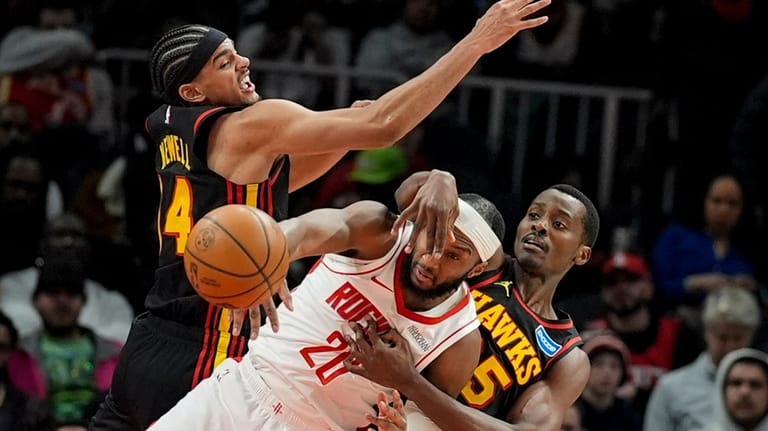 Houston Rockets guard Josh Okogie (20) moves the ball against...