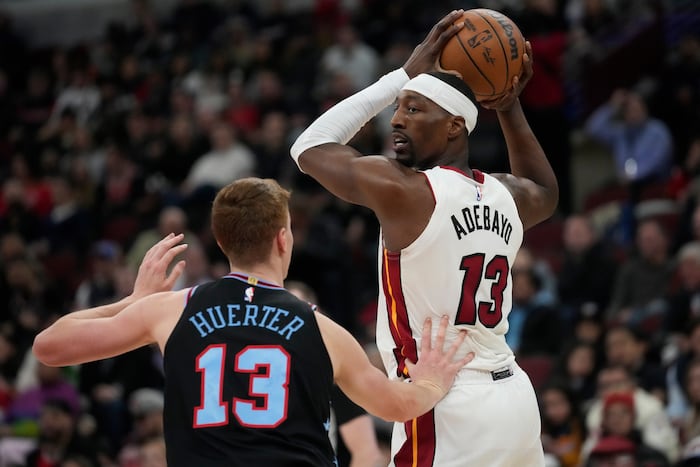 Powell scores 21 points and Heat outlast Bulls for 116-113 win