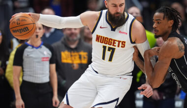 Murray scores 27, Nuggets beat Nets 107-103 in Porter's return to Denver