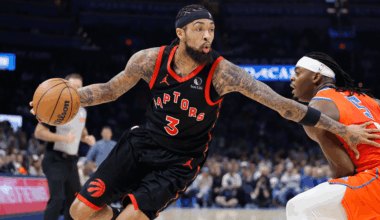 Brandon Ingram (3) dribbles past an Oklahoma City defender.