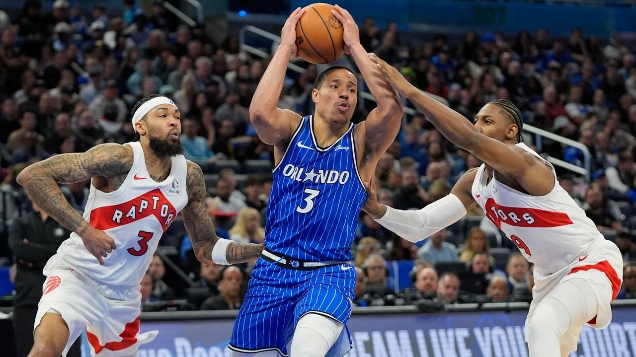 Bane leads Magic's rally in fourth quarter to beat Raptors 130-120
