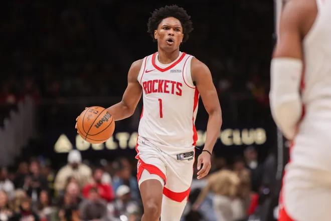 Jan 29, 2026; Atlanta, Georgia, USA; Houston Rockets guard Amen Thompson (1) dribbles th ball against the Atlanta Hawks in the third quarter at State Farm Arena.