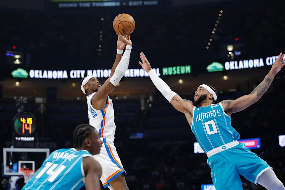 Jan 5, 2026; Oklahoma City, Oklahoma, USA; Oklahoma City Thunder guard Shai Gilgeous-Alexander (2) shoots over Charlotte Hornets forward Miles Bridges (0) during the second quarter at Paycom Center. Mandatory Credit: Alonzo Adams-Imagn Images