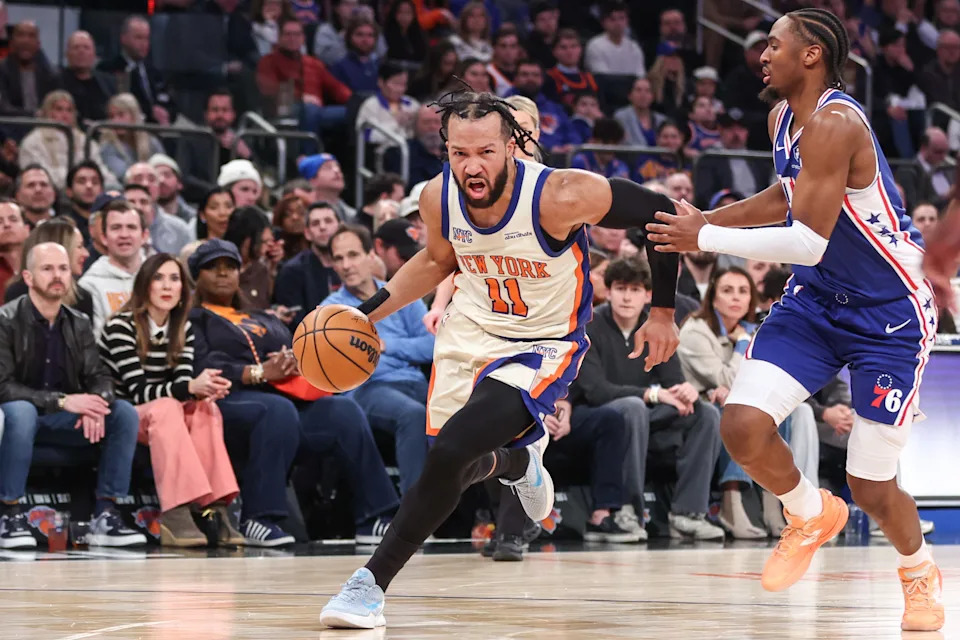 Jan 3, 2026; New York, New York, USA; New York Knicks guard Jalen Brunson (11) drives past Philadelphia 76ers guard Tyrese Maxey (0) in the first quarter at Madison Square Garden. Mandatory Credit: Wendell Cruz-Imagn Images