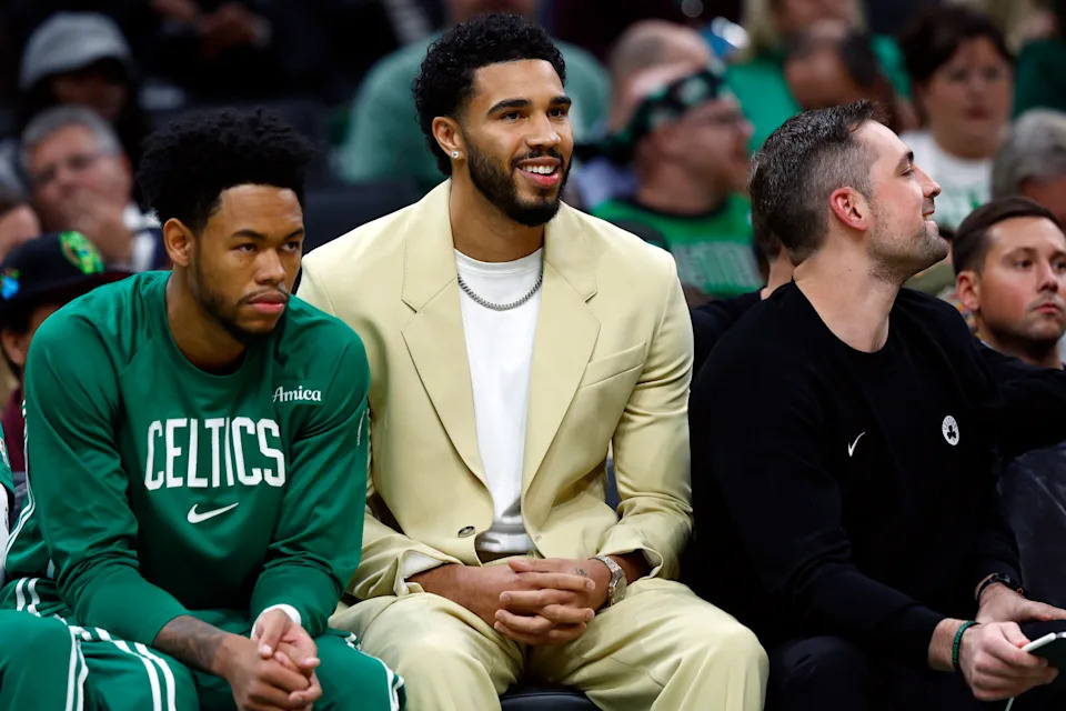Boston, MA - October 22: Boston Celtics forward Jayson Tatum sits on the bench with guard Anfernee Simons in the first quarter at TD Garden on October 22, 2025. (Photo by Danielle Parhizkaran/The Boston Globe via Getty Images)