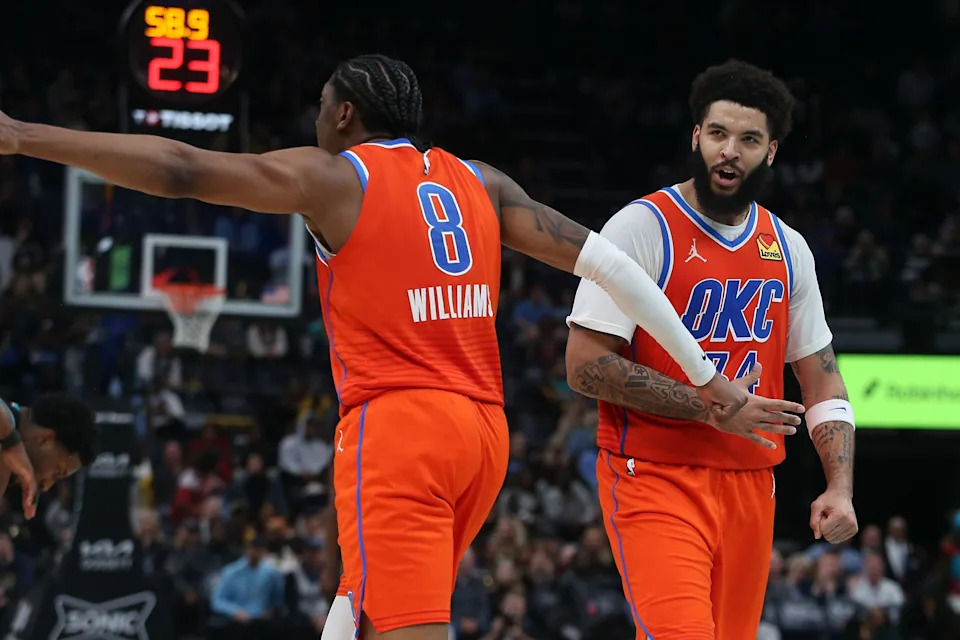 Jan 9, 2026; Memphis, Tennessee, USA; Oklahoma City Thunder guard Jalen Williams (8) and guard Kenrich Williams (34) react during the fourth quarter against the Memphis Grizzlies at FedExForum. Mandatory Credit: Petre Thomas-Imagn Images