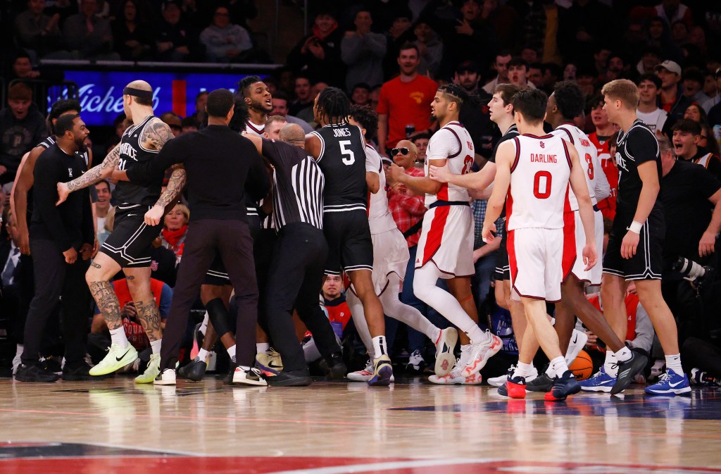 A scuffle breaks out between Zuby Ejiofor of the St. John's Red Storm and Jamier Jones of the Providence Friars.