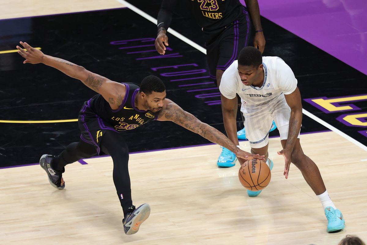 #36 PG Marcus Smart of the Los Angeles Lakers attempts to steal the basketball during an NBA game against the Memphis Grizzlies on January 2, 2026 in Los Angeles, CA.
