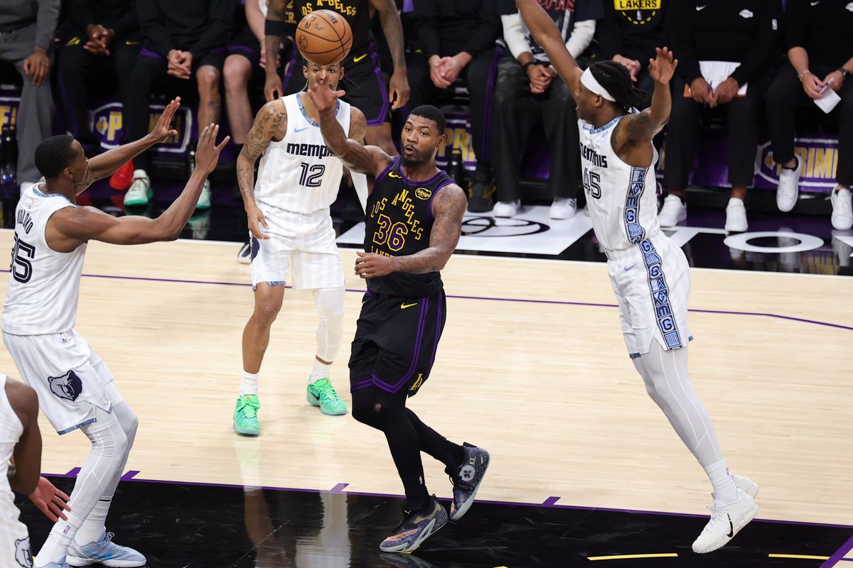 #36 PG Marcus Smart of the Los Angeles Lakers makes a pass during an NBA game against the Memphis Grizzlies on January 2, 2026 in Los Angeles, CA.