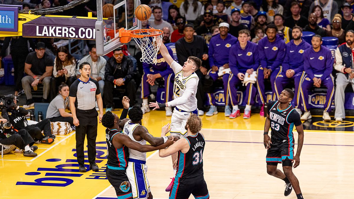Los Angeles Lakers Jake LaRavia takes a layup during NBA game against the Memphis Grizzlies on Sunday January 4th, 2026, in Los Angeles California. Los Angeles Lakers Jake LaRavia takes a layup during NBA game against the Memphis Grizzlies on Sunday January 4th, 2026, in Los Angeles California.
