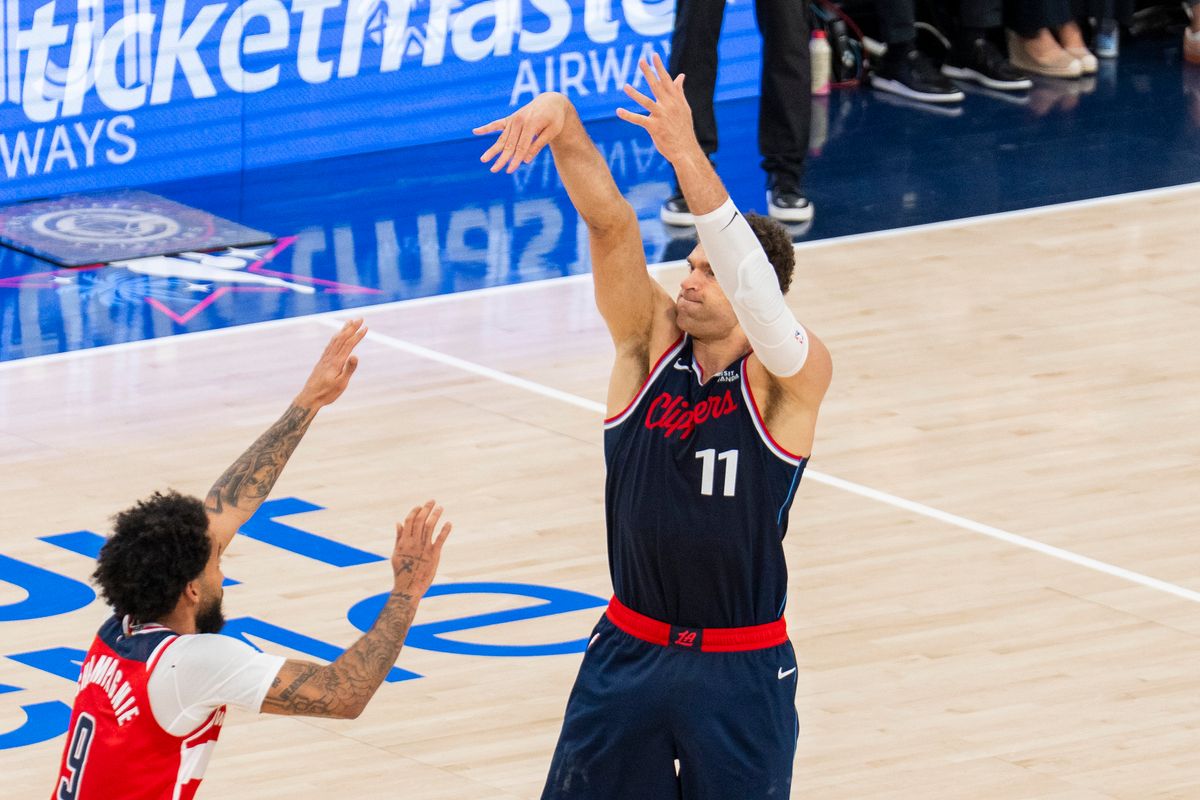 Los Angeles Clippers forward Brook Lopez (11) makes a three during an NBA basketball game against the Washington Wizards, Wednesday January 14th, 2026 in Los Angeles, California.