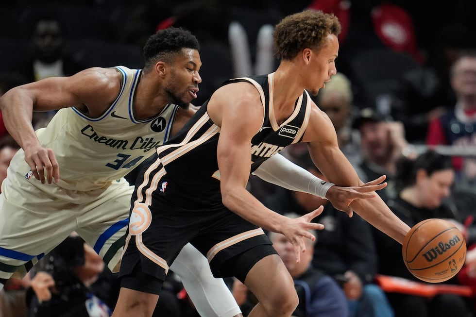 Atlanta Hawks guard Dyson Daniels (5) moves the ball against Milwaukee Bucks forward Giannis...