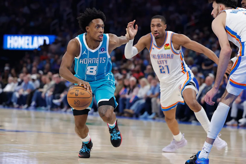Jan 5, 2026; Oklahoma City, Oklahoma, USA; Charlotte Hornets guard Collin Sexton (8) drives past Oklahoma City Thunder guard Aaron Wiggins (21) during the second half at Paycom Center. Mandatory Credit: Alonzo Adams-Imagn Images
