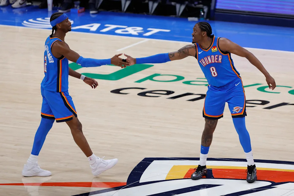 Jan 13, 2026; Oklahoma City, Oklahoma, USA; Oklahoma City Thunder guard/forward Jalen Williams (8) celebrates with guard Shai Gilgeous-Alexander (2) after he scored against the San Antonio Spurs during the second half at Paycom Center. Mandatory Credit: Alonzo Adams-Imagn Images