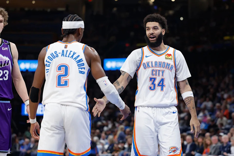 Jan 7, 2026; Oklahoma City, Oklahoma, USA; Oklahoma City Thunder guard/forward Kenrich Williams (34) and Oklahoma City Thunder guard Shai Gilgeous-Alexander (2) celebrate after a play against the Utah Jazz during the second half at Paycom Center. Mandatory Credit: Alonzo Adams-Imagn Images
