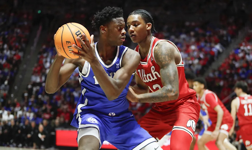 SALT LAKE CITY, UT – JANUARY 10: AJ Dybantsa #3 of the Brigham Young Cougars is pressured by Kendyl Sanders #13 of the Utah Utes during the first of their game at the Jon M Huntsman Center on January 10, 2026 in Salt Lake City, Utah.(Photo by Chris Gardner/Getty Images) | Getty Images