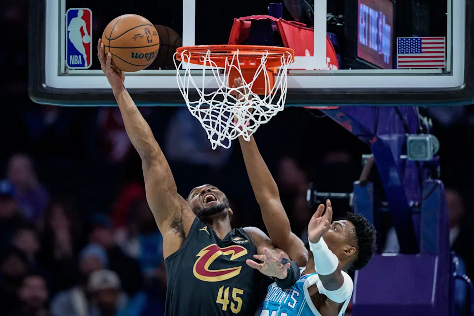 Cleveland Cavaliers guard Donovan Mitchell (45) goes to the basket while guarded by Charlotte Hornets guard Brandon Miller on Jan. 21, 2026, in Charlotte, North Carolina.\