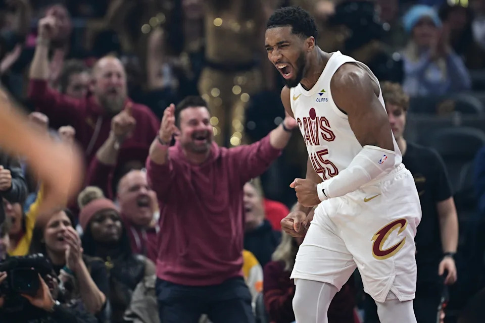 Dec 31, 2025; Cleveland, Ohio, USA; Cleveland Cavaliers guard Donovan Mitchell (45) reacts after being fouled and making the basket during the first half against the Phoenix Suns at Rocket Arena. Mandatory Credit: David Dermer-Imagn Images