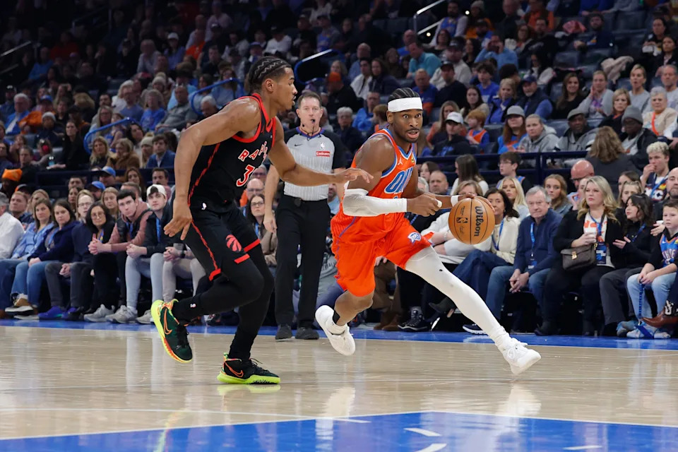 Jan 25, 2026; Oklahoma City, Oklahoma, USA; Oklahoma City Thunder guard Shai Gilgeous-Alexander (2) drives around Toronto Raptors guard Ochai Agbaji (30) during the second quarter at Paycom Center. Mandatory Credit: Alonzo Adams-Imagn Images