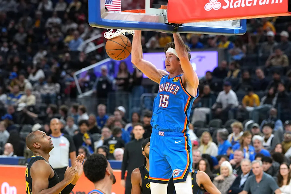 Jan 2, 2026; San Francisco, California, USA; Oklahoma City Thunder center Branden Carlson (15) dunks against the Golden State Warriors during the fourth quarter at Chase Center. Mandatory Credit: Darren Yamashita-Imagn Images