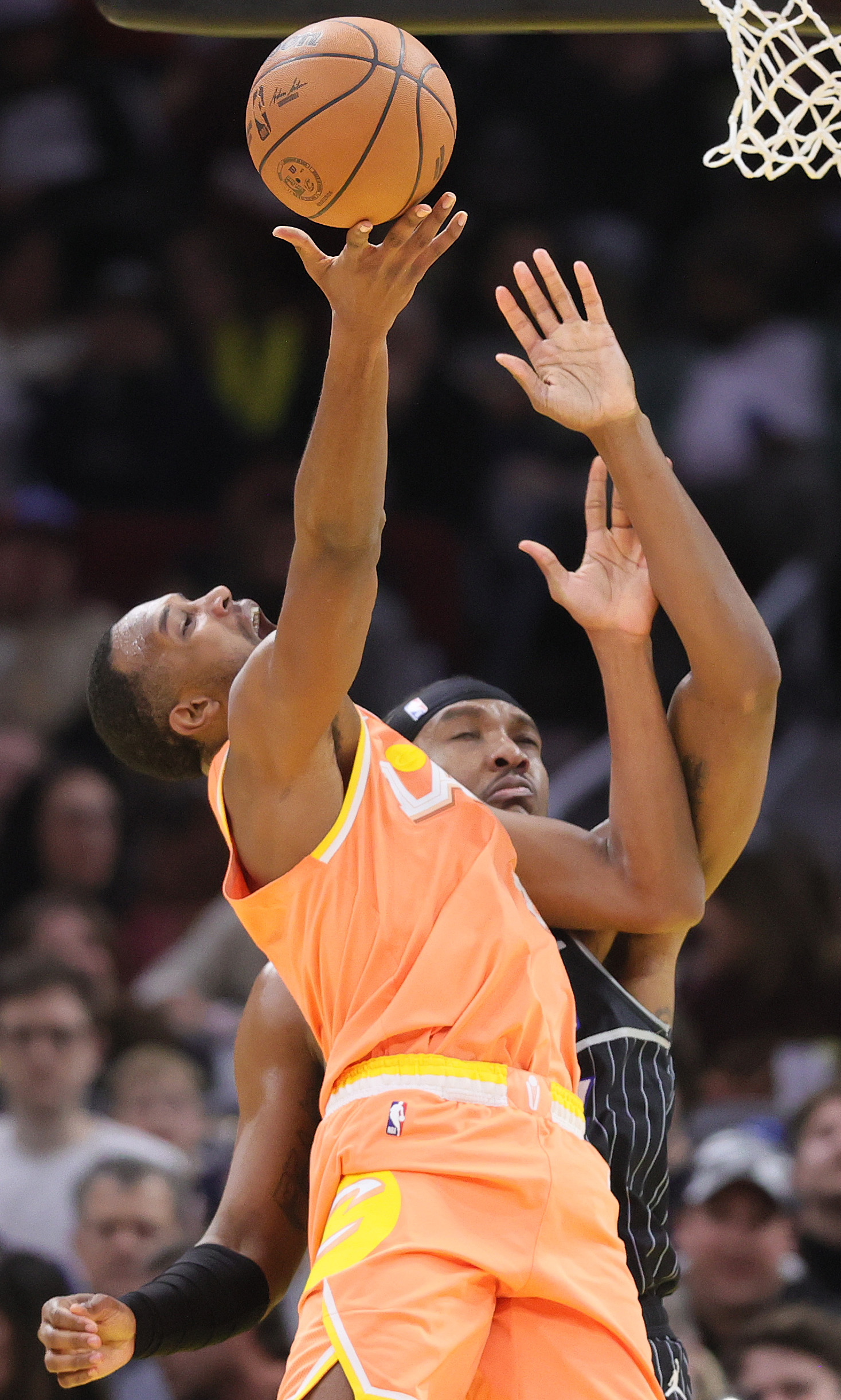 Cleveland Cavaliers center Evan Mobley goes up for a shot attempt guarded by Orlando Magic center Wendell Carter Jr. in the second half. 