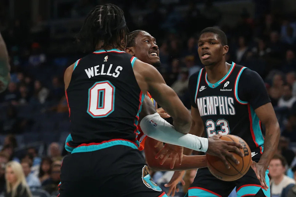 Jan 9, 2026; Memphis, Tennessee, USA; Oklahoma City Thunder guard Jalen Williams (8) drives to the basket as Memphis Grizzlies forward Jaylen Wells (0) defends during the first quarter at FedExForum. Mandatory Credit: Petre Thomas-Imagn Images