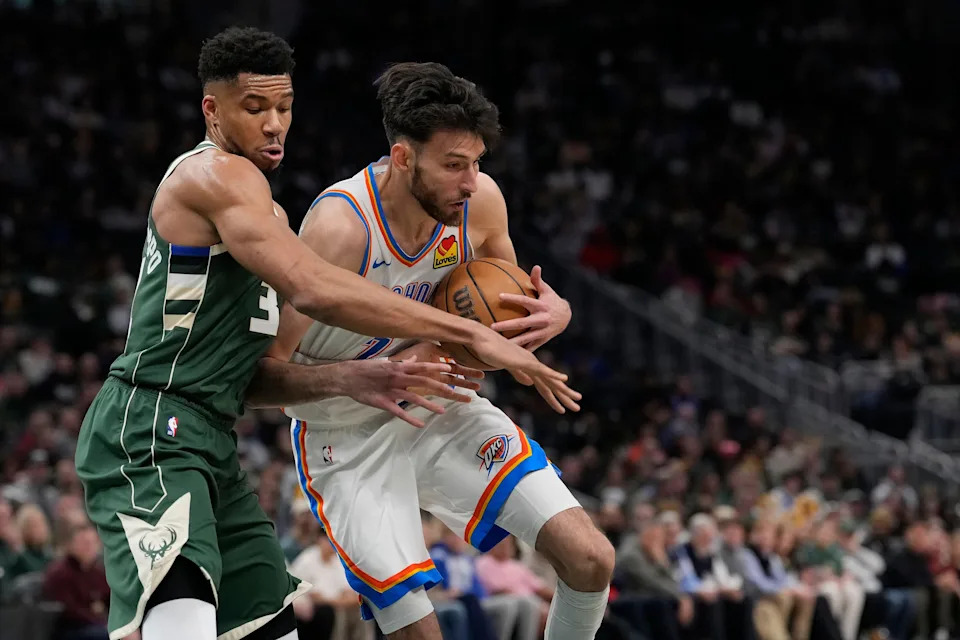 MILWAUKEE, WISCONSIN - JANUARY 21: Giannis Antetokounmpo #34 of the Milwaukee Bucks defends against Chet Holmgren #7 of the Oklahoma City Thunder during the first quarter at Fiserv Forum on January 21, 2026 in Milwaukee, Wisconsin. NOTE TO USER: User expressly acknowledges and agrees that, by downloading and or using this photograph, User is consenting to the terms and conditions of the Getty Images License Agreement. (Photo by Patrick McDermott/Getty Images)