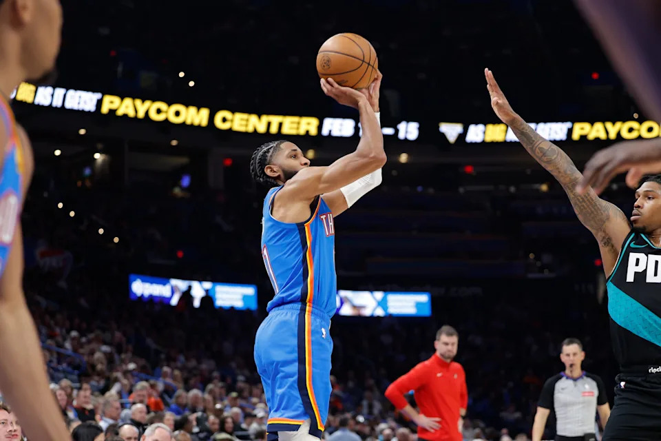 Dec 31, 2025; Oklahoma City, Oklahoma, USA; Oklahoma City Thunder guard Isaiah Joe (11) shoots a three point basket against the Portland Trail Blazers during the second half at Paycom Center. Mandatory Credit: Alonzo Adams-Imagn Images