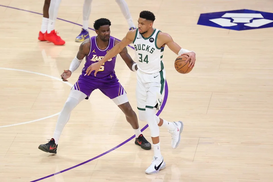 Los Angeles Lakers C Deandre Ayton (5) guards Milwaukee Bucks SF Giannis Antetokounmpo (34) during an NBA game on January 9, 2026 in Los Angeles, CA.