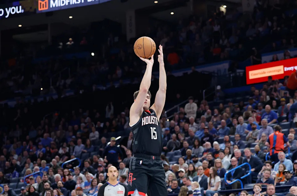 Mar 3, 2025; Oklahoma City, Oklahoma, USA; Houston Rockets guard Reed Sheppard (15) shoots a three point basket against the Oklahoma City Thunder during the second half at Paycom Center. Mandatory Credit: Alonzo Adams-Imagn Images