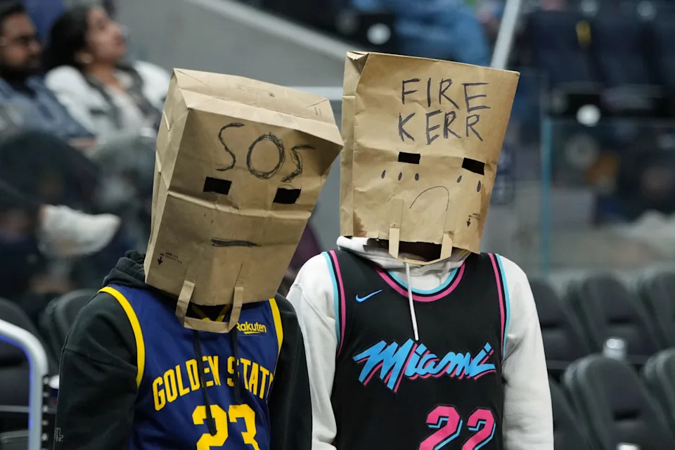 Jan 2, 2026; San Francisco, California, USA; Fans wear bags over their heads during the fourth quarter of the game between the Golden State Warriors and the Oklahoma City Thunder at Chase Center. Mandatory Credit: Darren Yamashita-Imagn Images