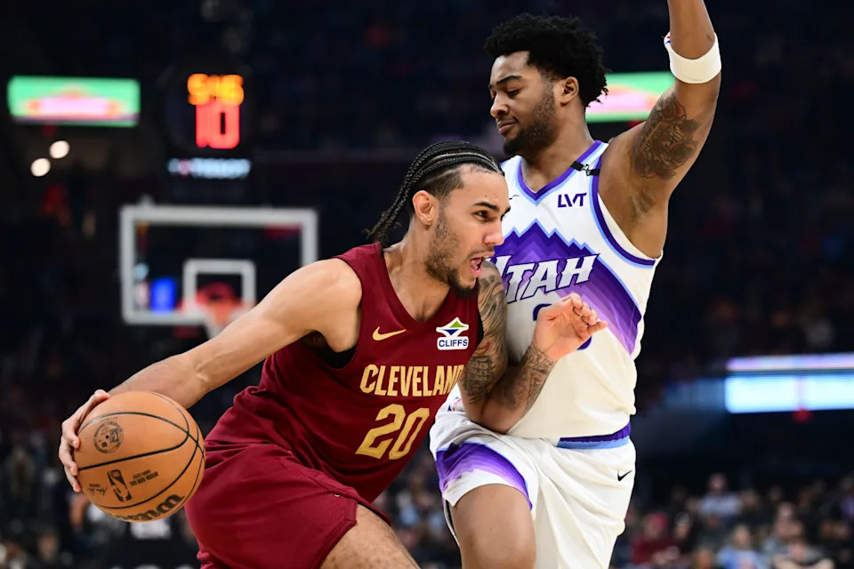 Cavaliers guard Jaylon Tyson drives to the basket against Utah Jazz forward Brice Sensabaugh, Jan. 12, 2026, in Cleveland.