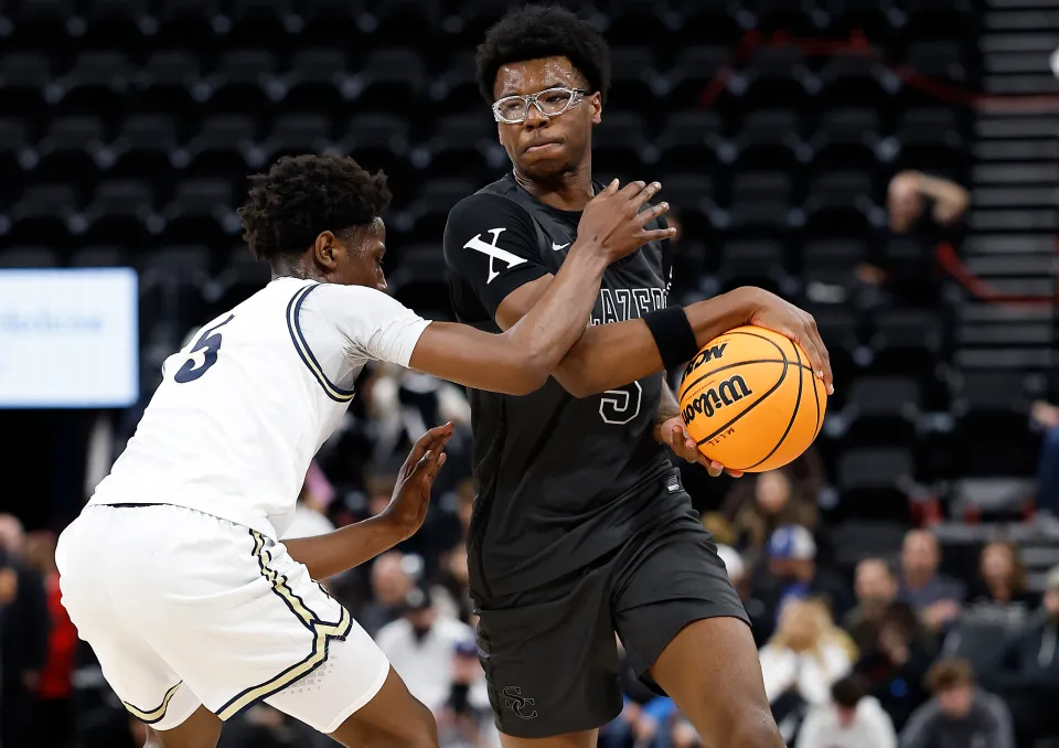 Bryce James #5 of Sierra Canyon controls the ball against NaVorro Bowman #5 of Notre Dame in the first half at Intuit Dome on February 01, 2025 in Inglewood, California.
