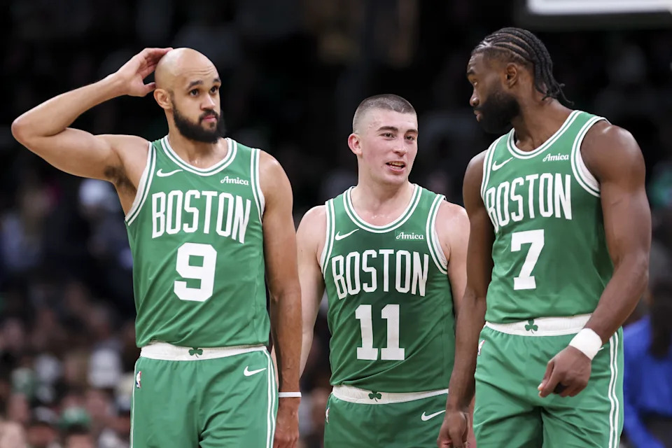 BOSTON, MA – DECEMBER 12: Derrick White #9 of the Boston Celtics, Payton Pritchard #11 of the Boston Celtics, Jaylen Brown #7 of the Boston Celtics react during a game against the Detroit Pistons at TD Garden on December 12, 2024 in Boston, Massachusetts. NOTE TO USER: User expressly acknowledges and agrees that, by downloading and or using this photograph, User is consenting to the terms and conditions of the Getty Images License Agreement. (Photo by Adam Glanzman/Getty Images)