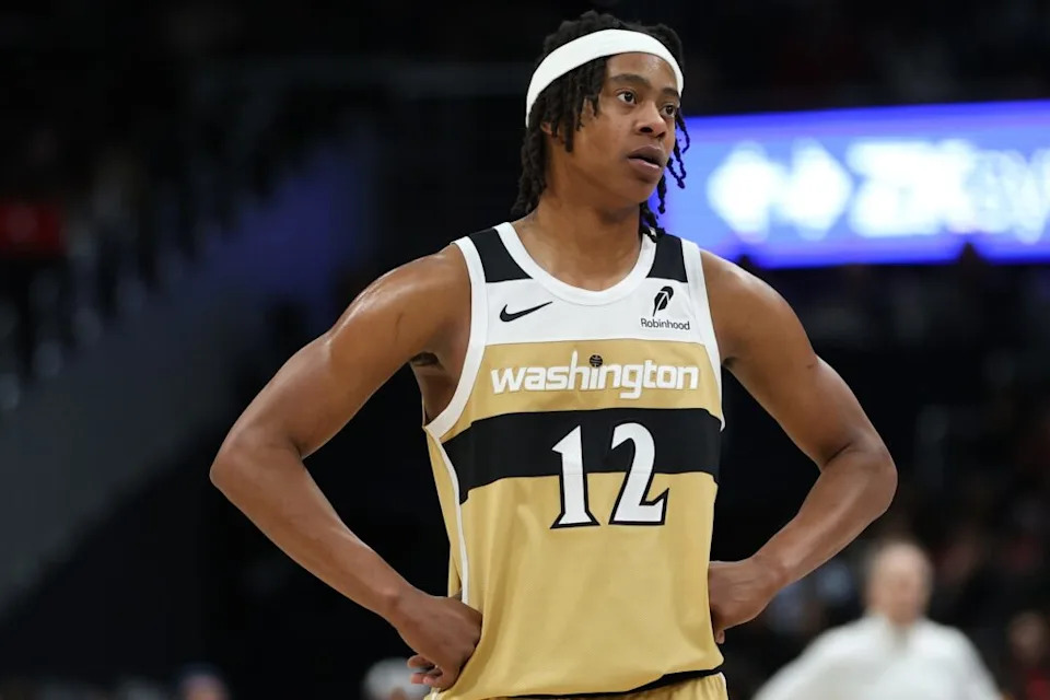 Jan 2, 2026; Washington, District of Columbia, USA; Washington Wizards guard Tre Johnson (12) looks on during the second half against the Brooklyn Nets at Capital One Arena. Mandatory Credit: Daniel Kucin Jr.-Imagn Images