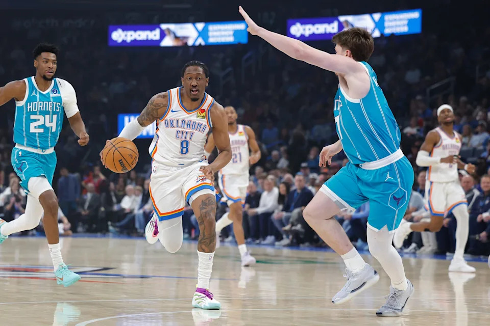 Jan 5, 2026; Oklahoma City, Oklahoma, USA; Oklahoma City Thunder guard Jalen Williams (8) drives down the court between Charlotte Hornets forward Brandon Miller (24) and guard Kon Knueppel (7) during the first quarter at Paycom Center. Mandatory Credit: Alonzo Adams-Imagn Images