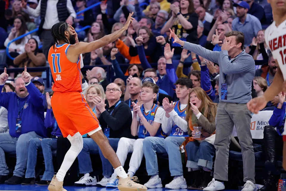 Jan 11, 2026; Oklahoma City, Oklahoma, USA; Oklahoma City Thunder guard Isaiah Joe (11) gestures after scoring a three point basket against the Miami Heat during the second half at Paycom Center. Mandatory Credit: Alonzo Adams-Imagn Images