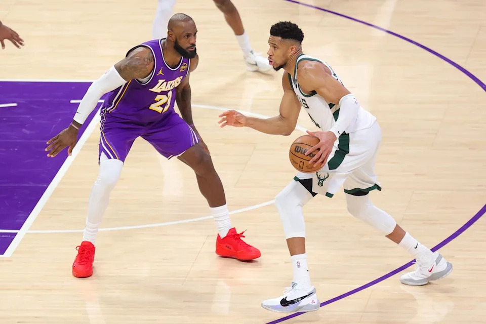 Los Angeles Lakers SF LeBron James (23) guards Milwaukee Bucks SF Giannis Antetokounmpo (34) during an NBA game on January 9, 2026 in Los Angeles, CA.