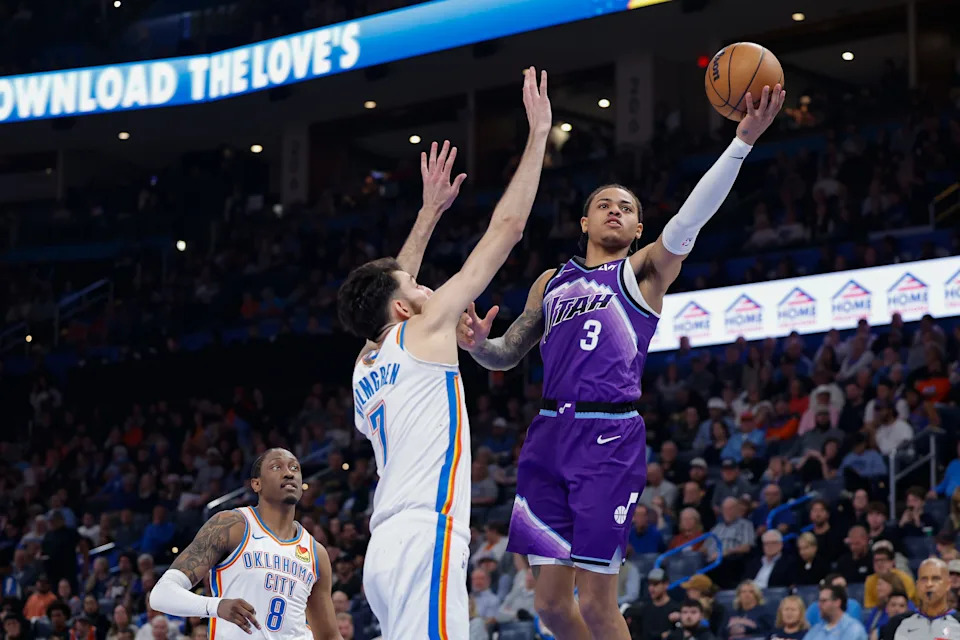 Jan 7, 2026; Oklahoma City, Oklahoma, USA; Utah Jazz guard Keyonte George (3) goes up for a basket beside Oklahoma City Thunder center/forward Chet Holmgren (7) during the second half at Paycom Center. Mandatory Credit: Alonzo Adams-Imagn Images