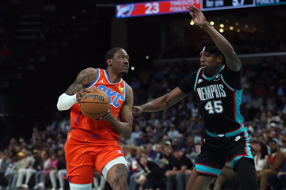 Jan 9, 2026; Memphis, Tennessee, USA; Oklahoma City Thunder guard Jalen Williams (8) drives to the basket as Memphis Grizzlies forward GG Jackson II (45) defends during the second quarter at FedExForum. Mandatory Credit: Petre Thomas-Imagn Images