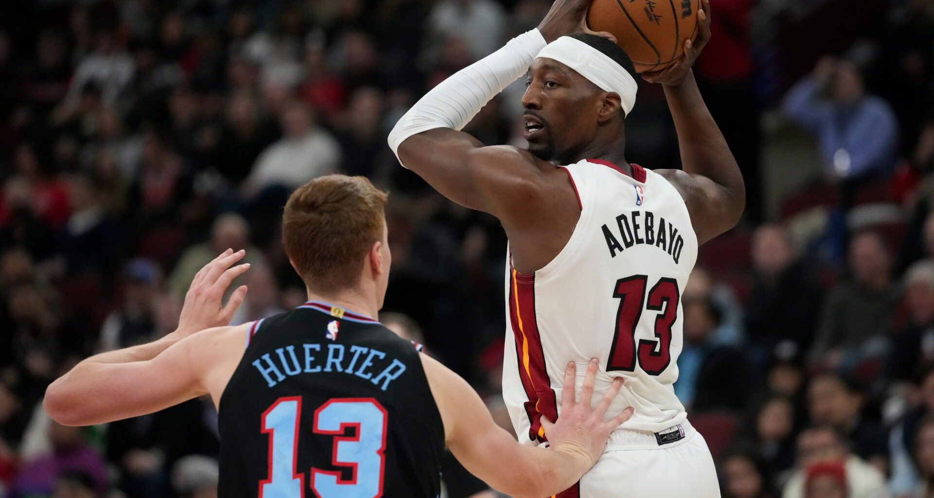 Powell scores 21 points and Heat outlast Bulls for 116-113 win