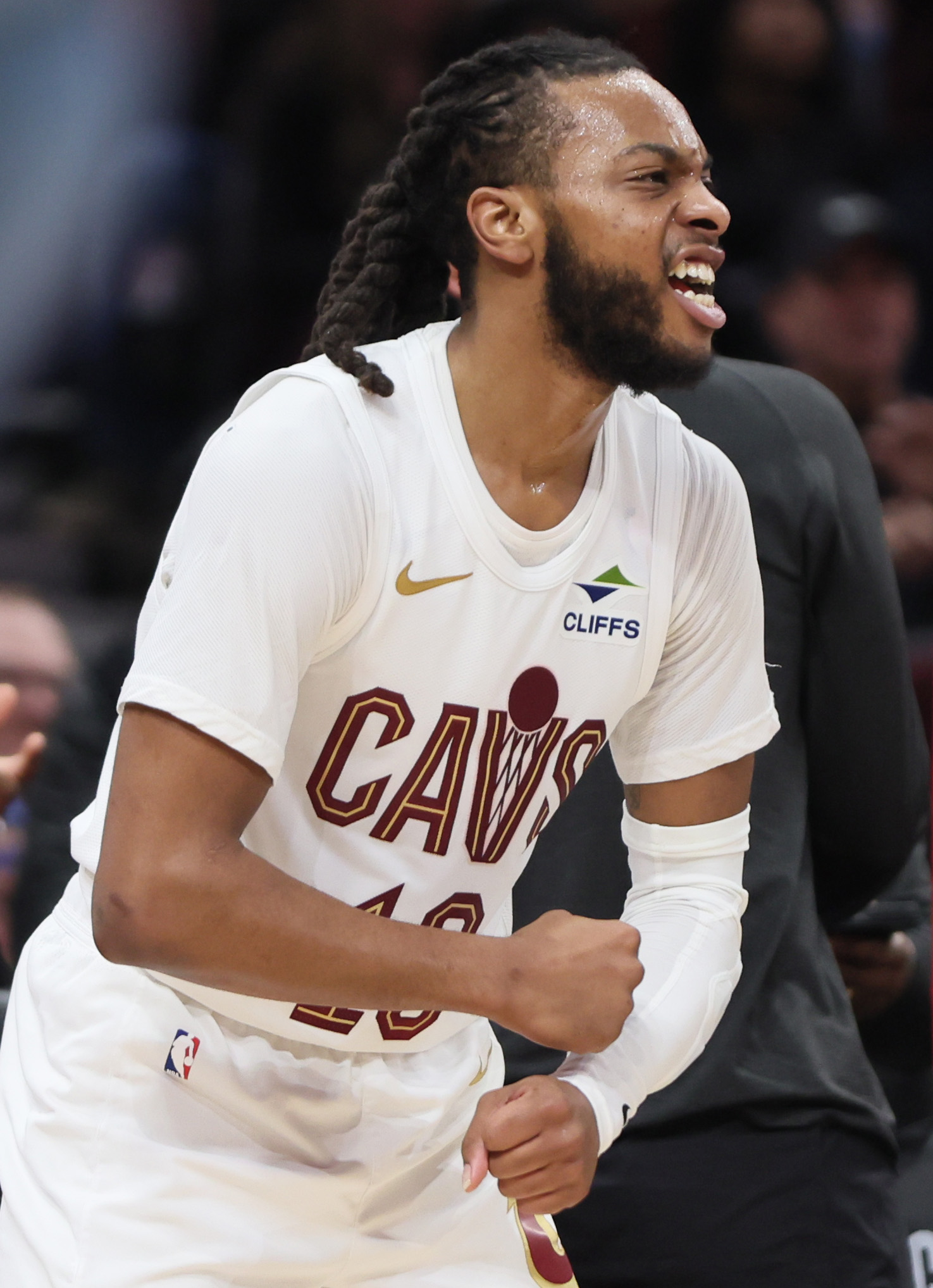 Cleveland Cavaliers guard Darius Garland reacts to a score from the bench in the second half. 