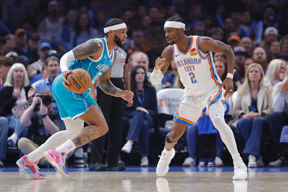 Jan 5, 2026; Oklahoma City, Oklahoma, USACharlotte Hornets forward Miles Bridges (0) drives to the basket against Oklahoma City Thunder guard Shai Gilgeous-Alexander (2) during the first quarter at Paycom Center. Mandatory Credit: Alonzo Adams-Imagn Images