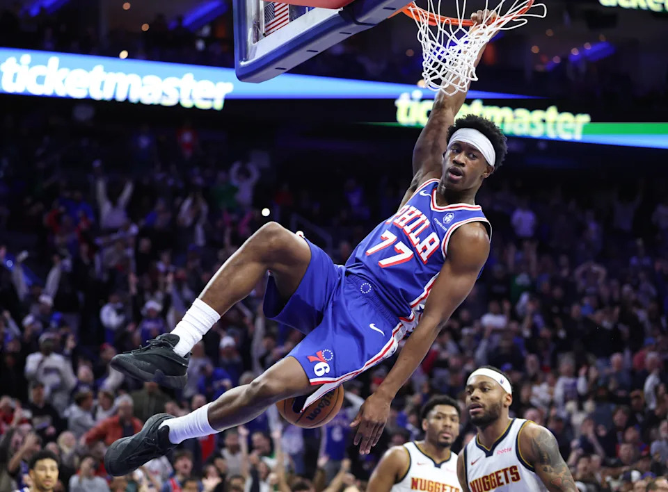 Jan 5, 2026; Philadelphia, Pennsylvania, USA; Philadelphia 76ers guard Vj Edgecombe (77) dunks the ball against the Denver Nuggets during overtime at Xfinity Mobile Arena. Mandatory Credit: Bill Streicher-Imagn Images