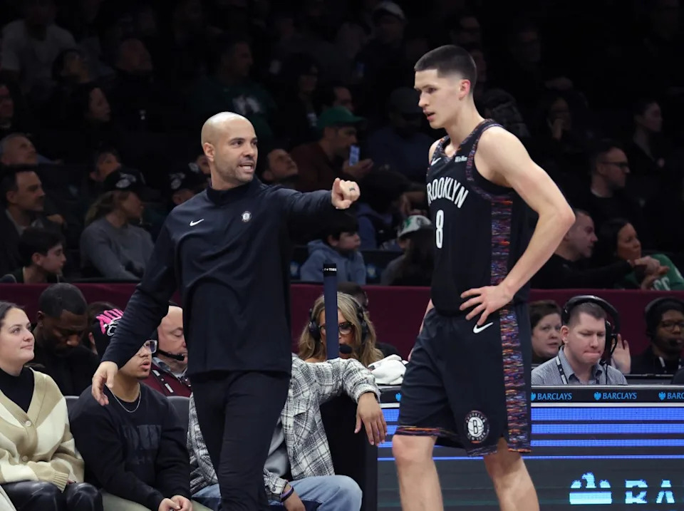 Nets head coach Jordi Fernández taking to guard Egor Dёmin in the third quarter of a recent game. Charles Wenzelberg / New York Post