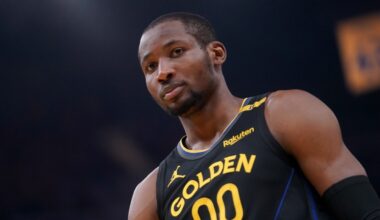 Golden State Warriors guard Stephen Curry (30) and head coach Steve Kerr talk on the sideline during the first quarter against the Utah Jazz at Delta Center.