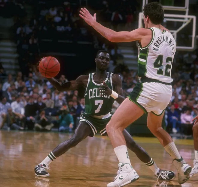 Kelvin Upshaw of the Boston Celtics moves the ball during a game versus the Milwaukee Bucks at the Bradley Center in Milwaukee, Wisconsin. Jonathan Daniel/Getty Images