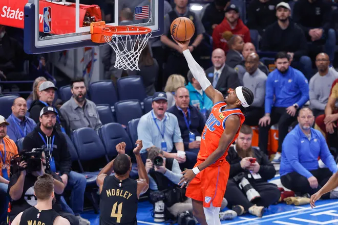 Jan 16, 2025; Oklahoma City, Oklahoma, USA; Oklahoma City Thunder guard Shai Gilgeous-Alexander (2) goes to the basket against the Cleveland Cavaliers during the first quarter at Paycom Center. Mandatory Credit: Alonzo Adams-Imagn Images