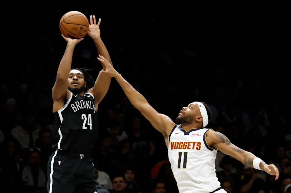 Cam Thomas shoots over Bruce Brown during the second half of the Nets’ loss to the Nuggets on Jan. 4, 2026 at Barclays Center. JASON SZENES/ NY POST